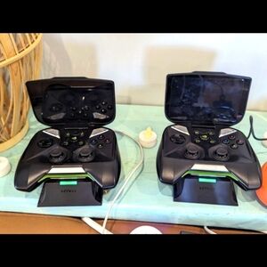 Nividia Shield Portable Systems for gaming + 3 Nyko HDMI TV Charging docks